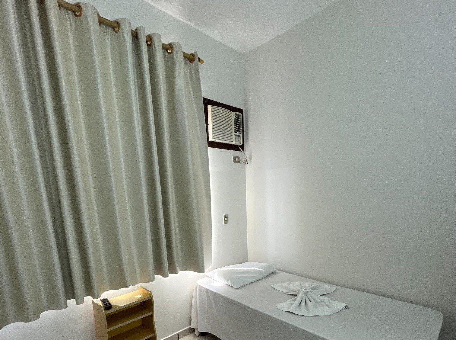 Quarto Individual com uma cama de solteiro